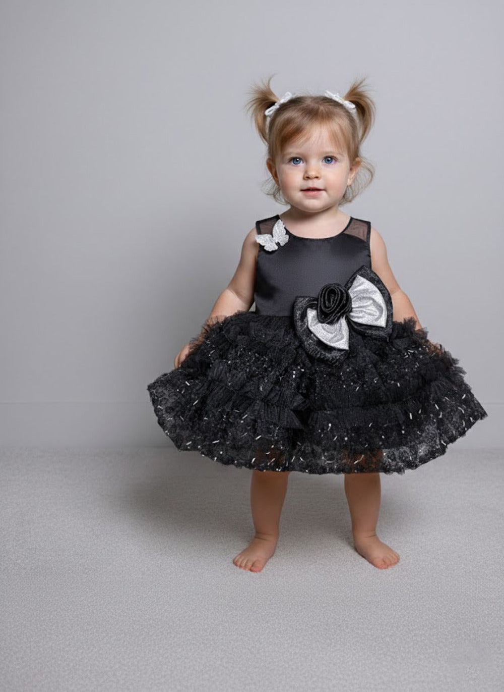 Katibi Kids elegant Black bow midi dress.