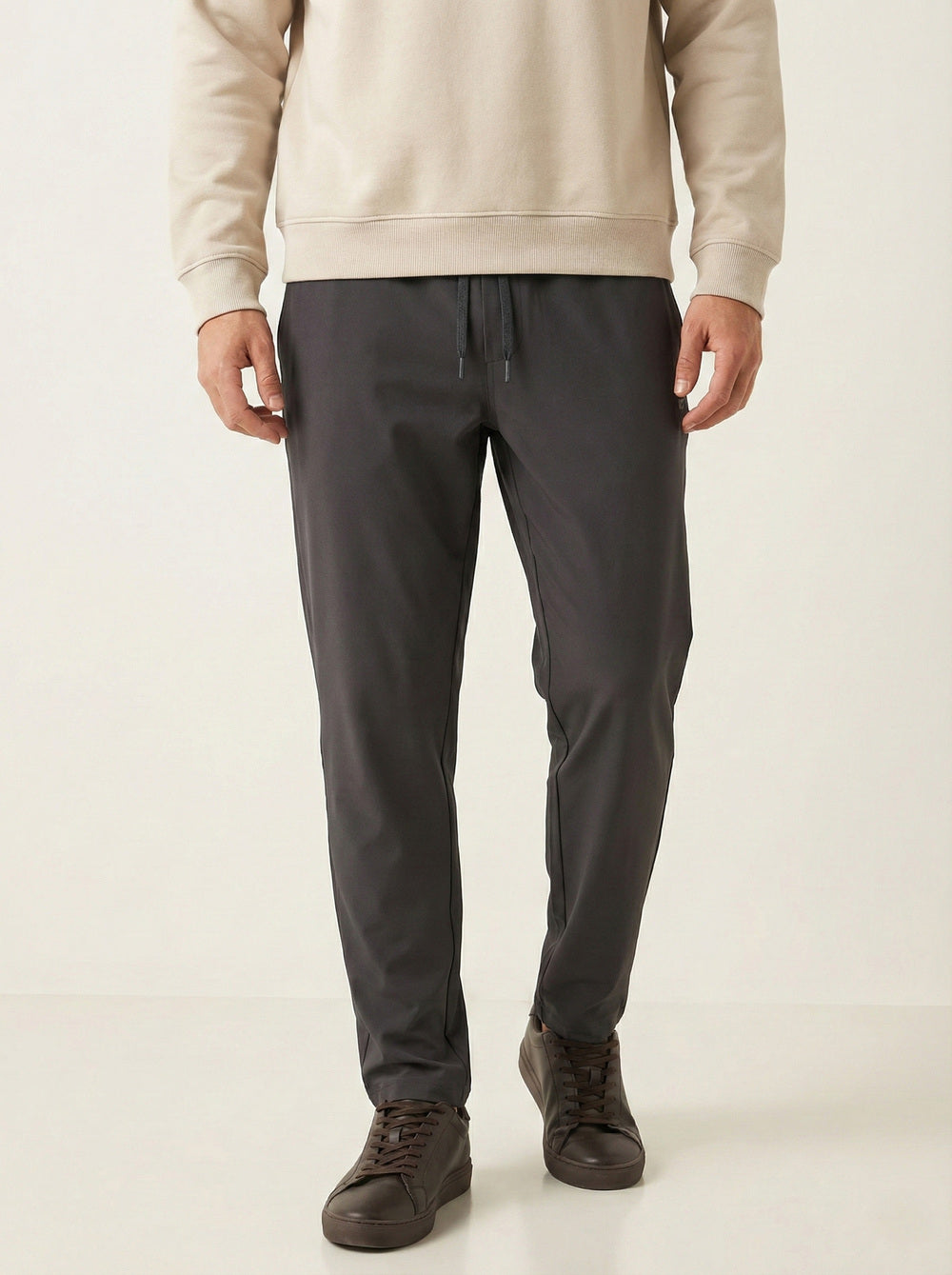 On Vers Mens Solid  Lightweight Comfort Fit Track Pant.